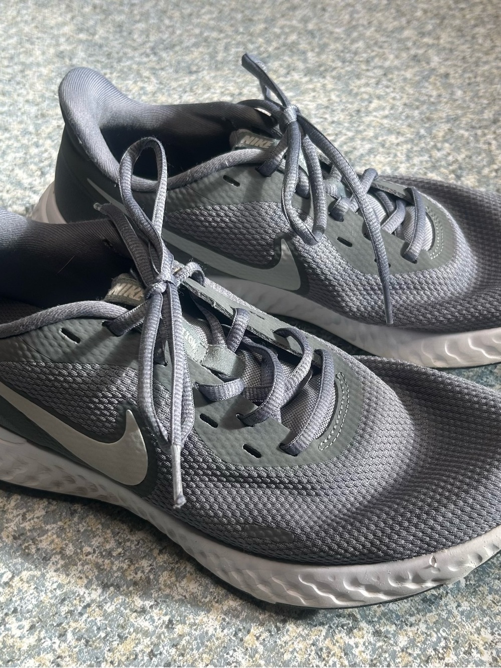 Nike Gray Athletic Sneakers with White Swoosh